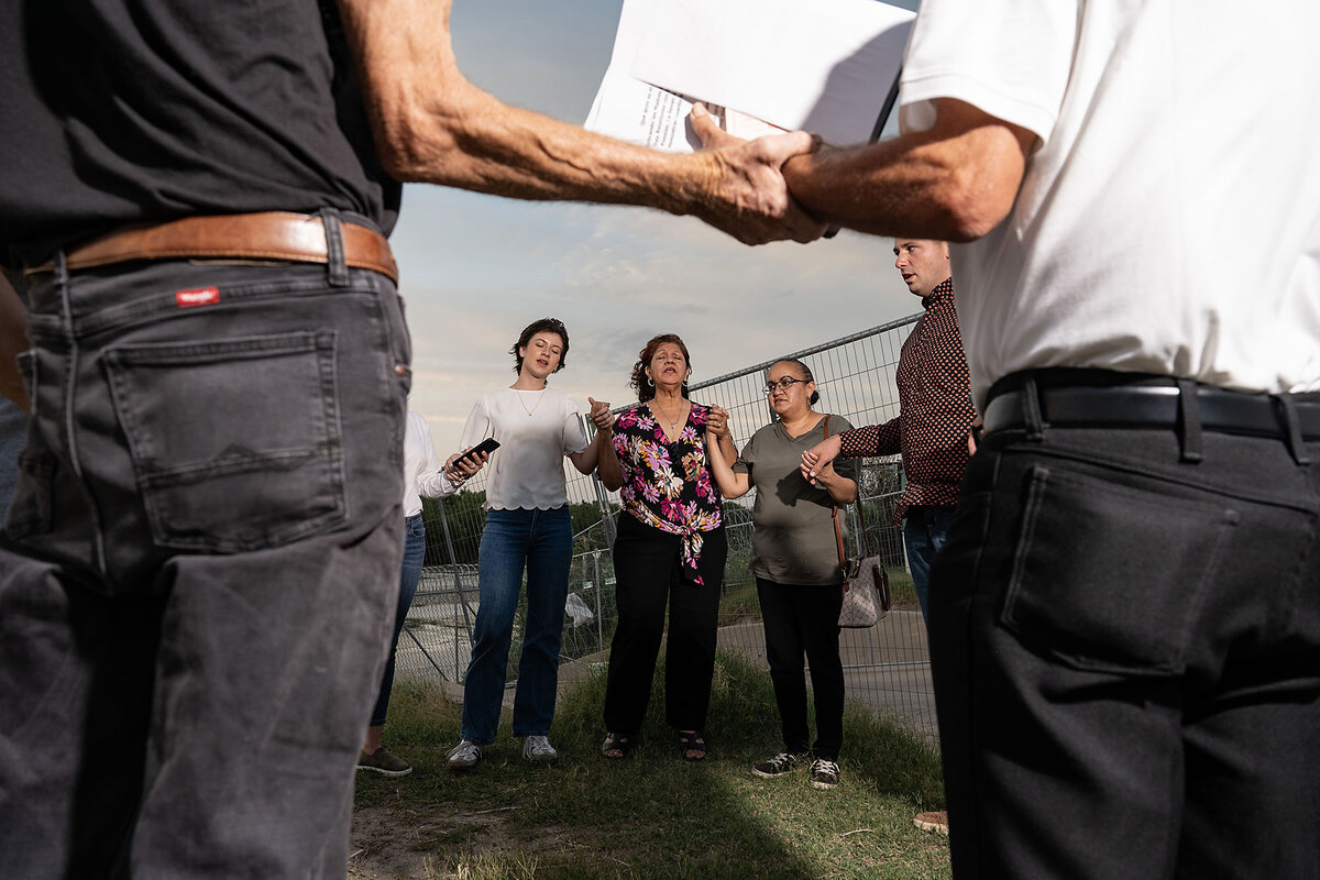 People gather for a vigil May 5 at Shelby Park by the Rio Grande in Eagle Pass, Texas, in part to honor people who died as they attempted to cross the border from Mexico into the U.S. The park, which was closed last year as authorities dealt with border crossings, is now partially open. 